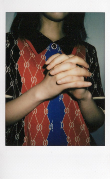 Close Polaroid of folded hands