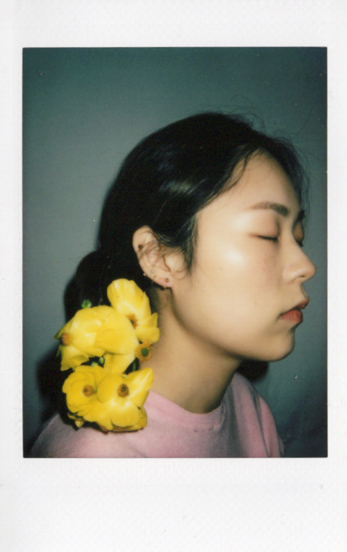 Profile portrait with yellow flowers