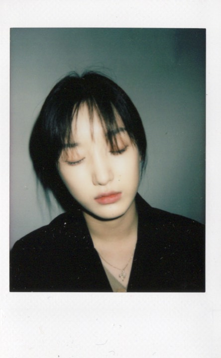 Close Polaroid portrait with eyes closed