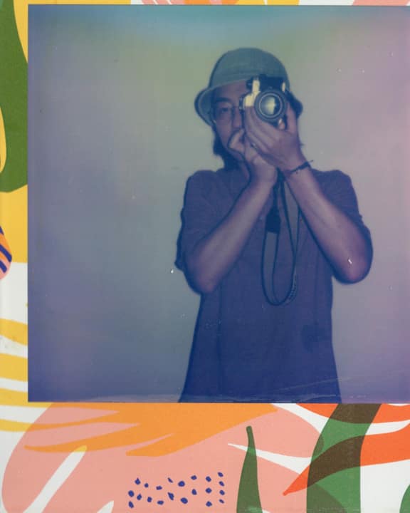 Self-portrait with a Polaroid camera