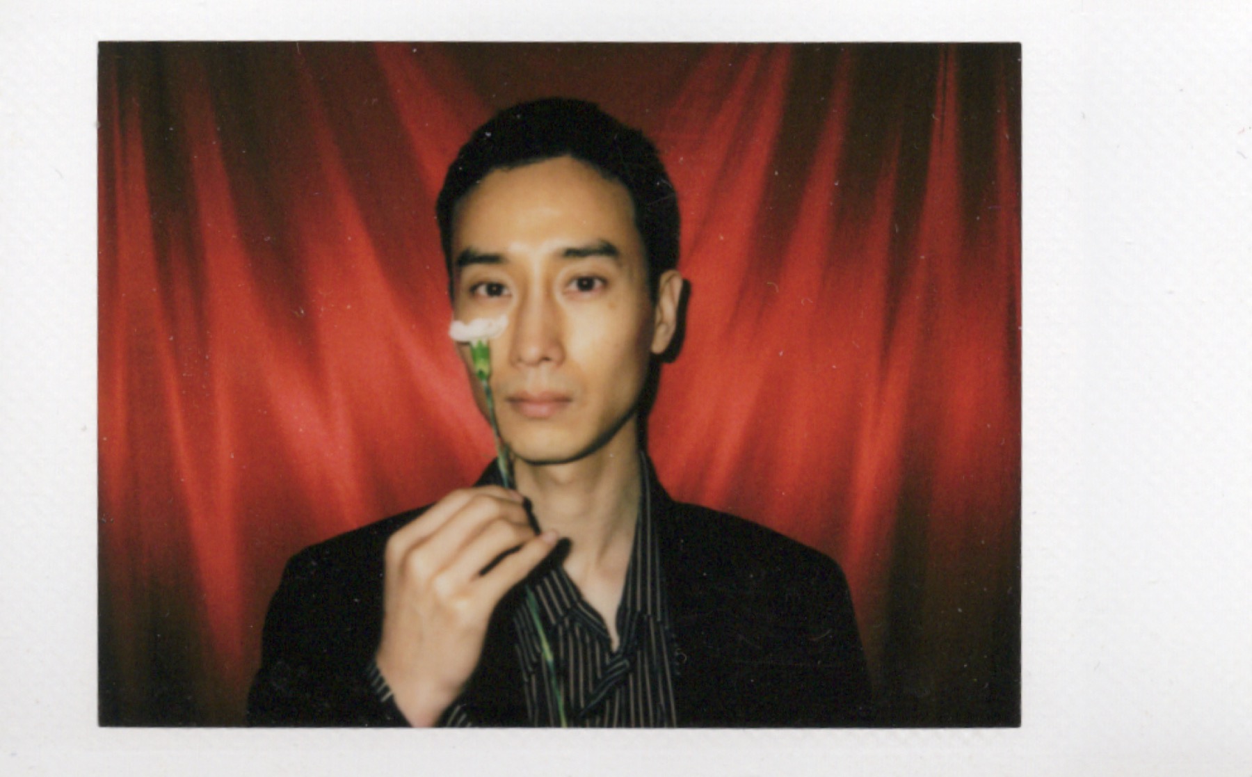 Polaroid portrait with vivid colored framing