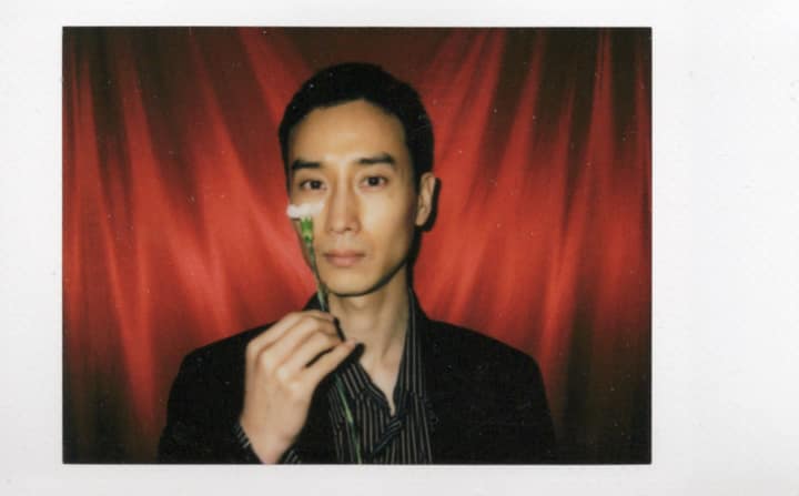 Polaroid portrait with vivid colored framing